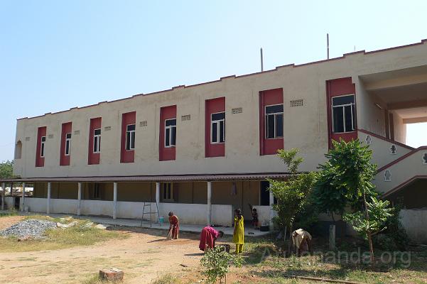P1060011.JPG - Dining hall on the lower floor and staff quarters on the upper floor